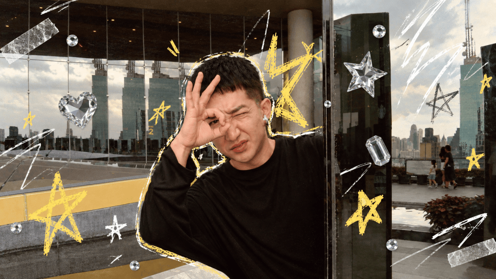 Harris posing in front of reflective glass, surrounded by hand-drawn stars and crystal decorations.