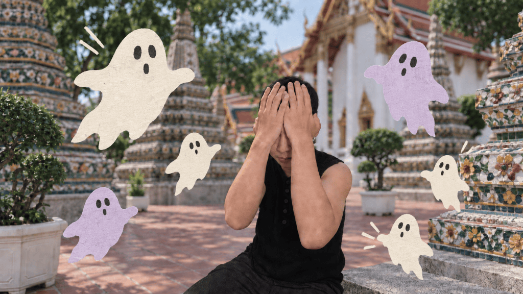 Harris covering his face while illustrated ghosts float around him at a Thai temple.